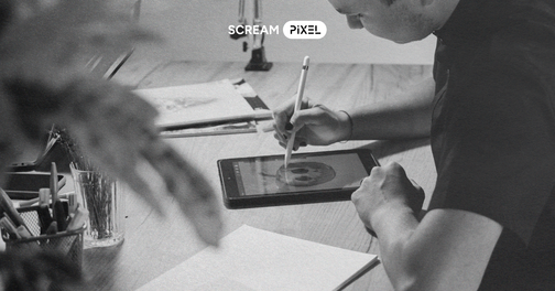 Black-and-white photo of a designer sketching on a tablet with a stylus at a desk, with design tools and papers nearby, featuring the Scream Pixel logo.